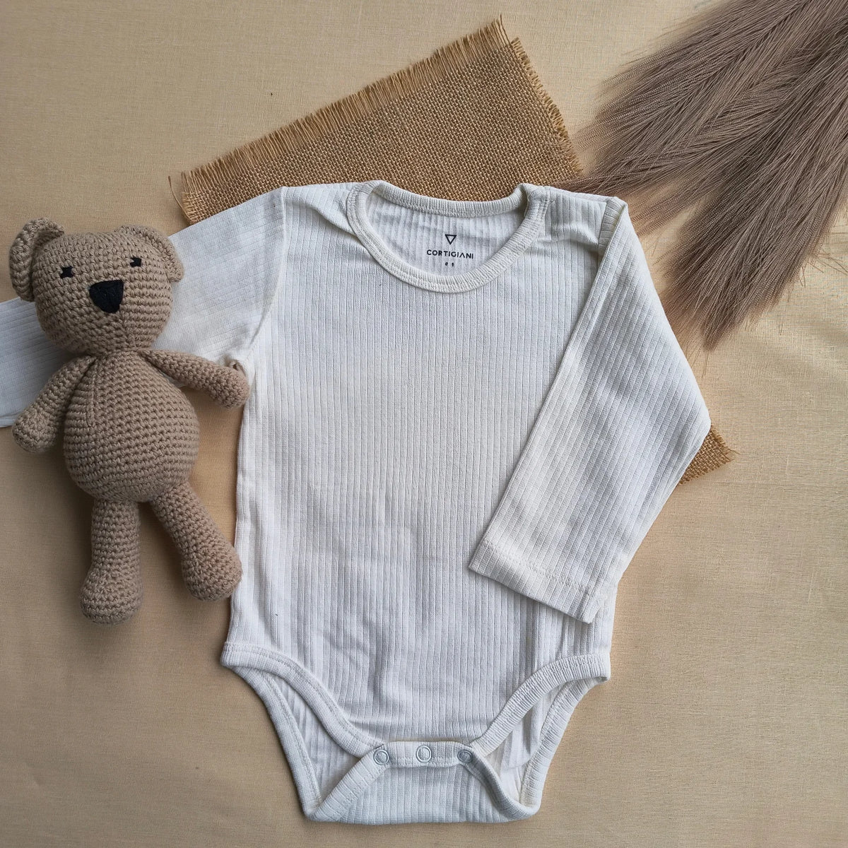 White branded bodysuit