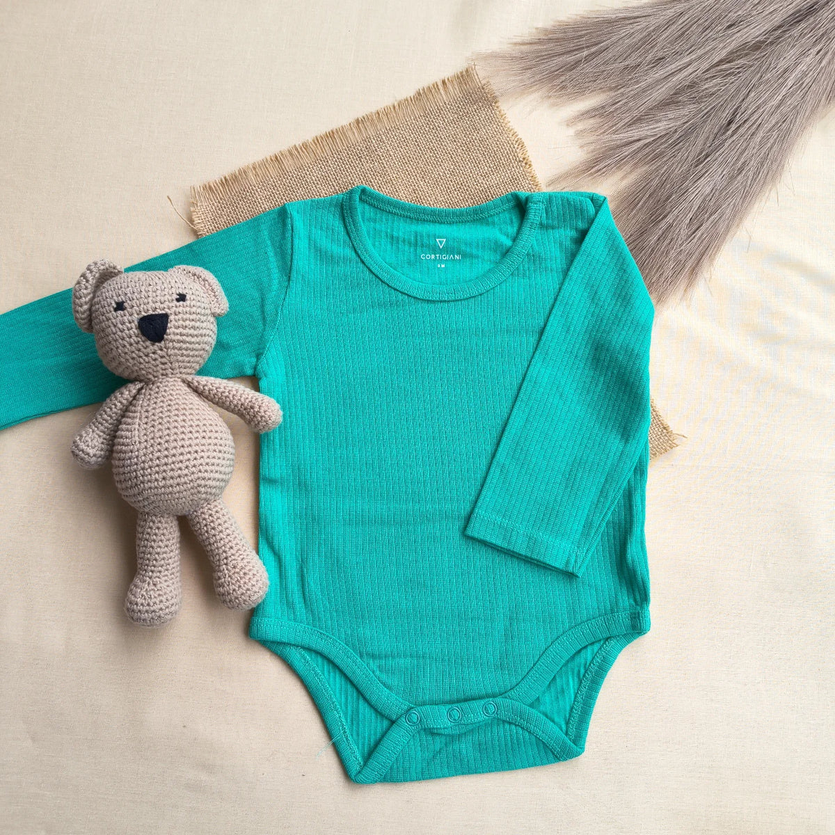Green branded bodysuit