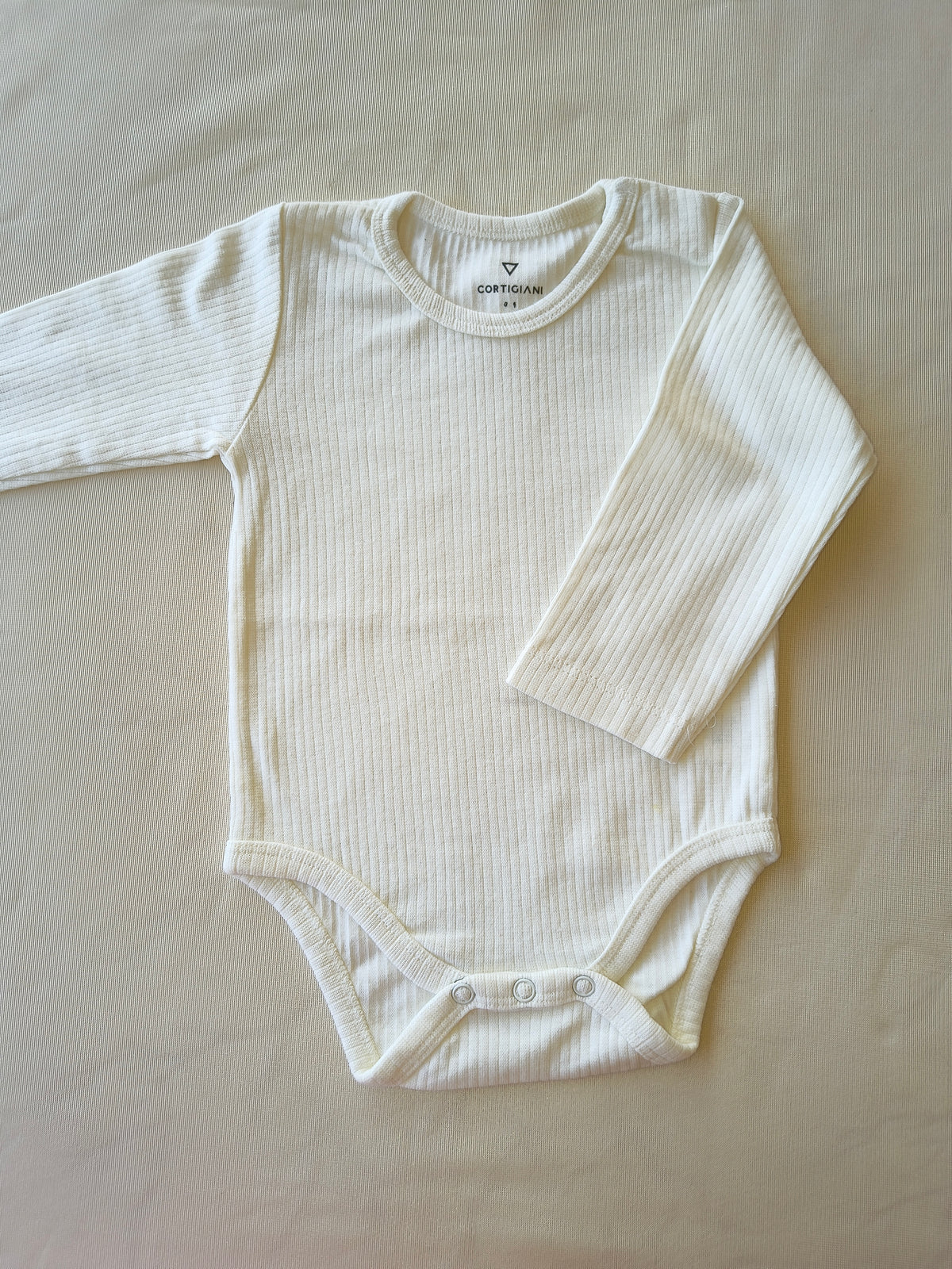 Cream branded body suit